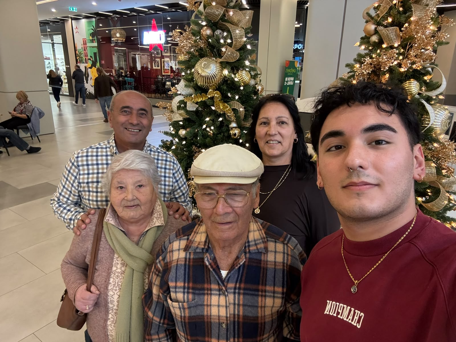 The family together at Christmas with grandparents
